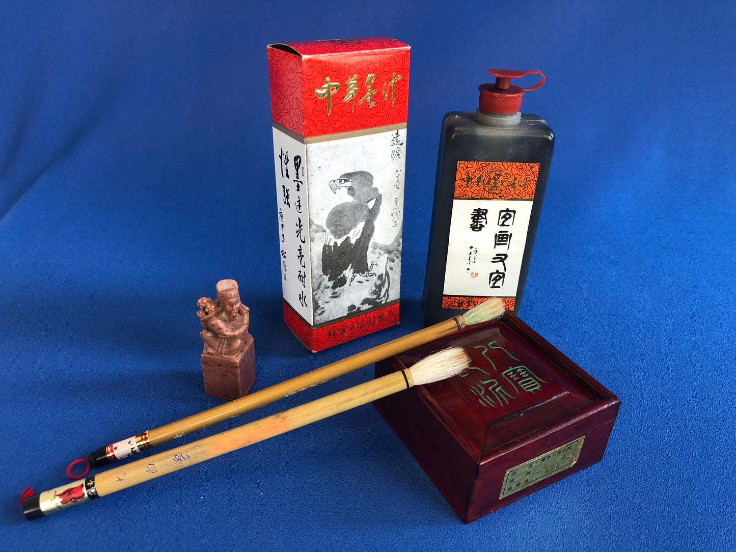 chinese calligraphy kit: ink, brushes and stamp