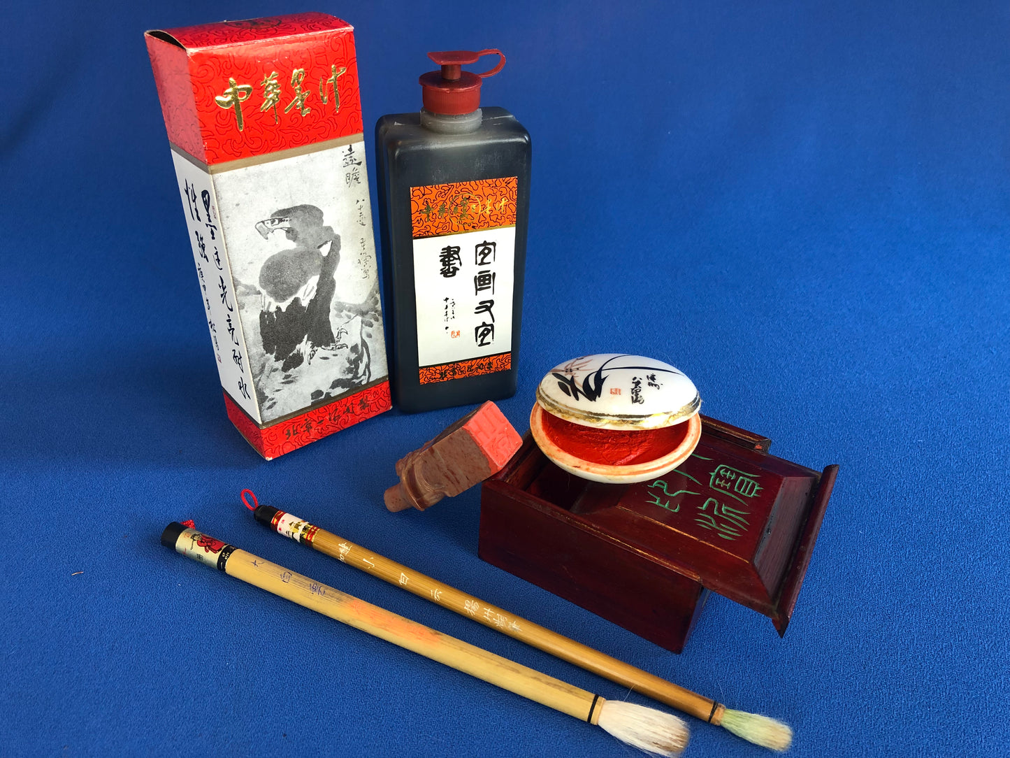 chinese calligraphy kit: ink, brushes and stamp