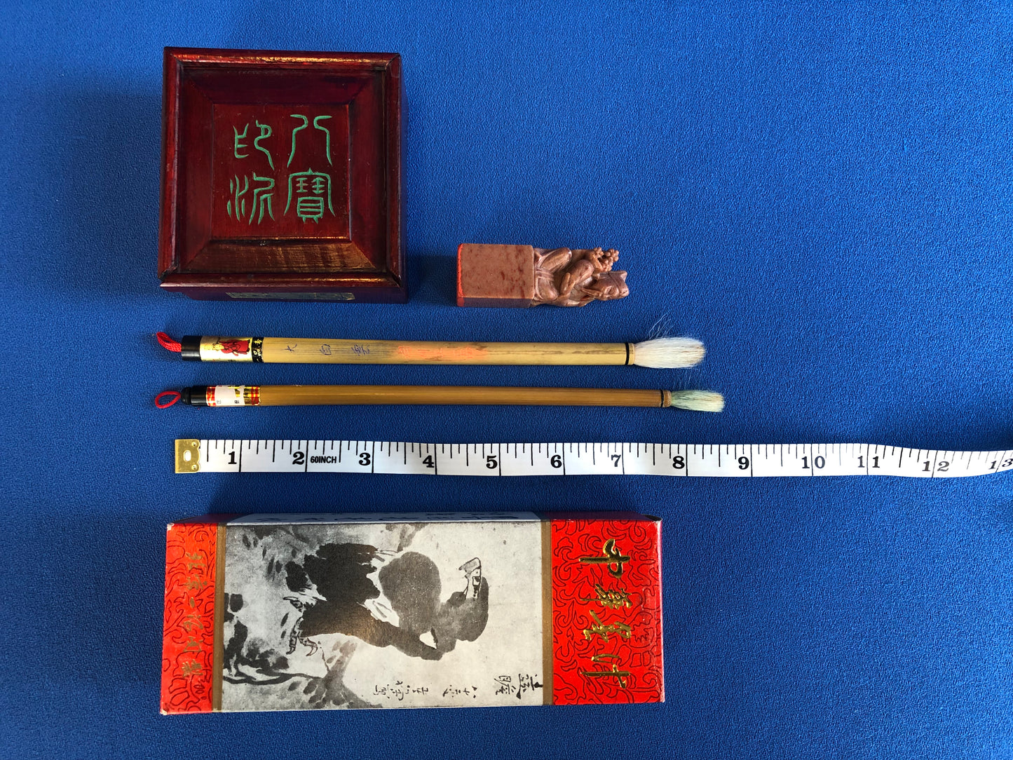 chinese calligraphy kit: ink, brushes and stamp