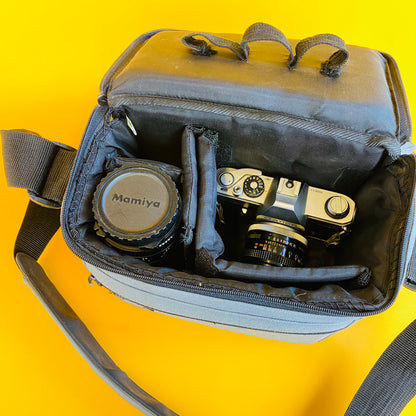 canon film camera and two lenses